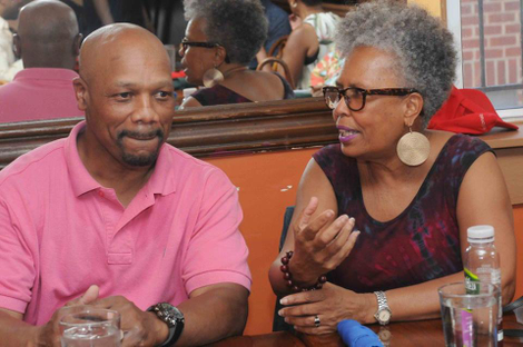 Journalist Patrice Gaines and freed inmate Christopher Turner on June 11 at the Journalists Roundtable in Washington. (Jason Miccolo Johnson)